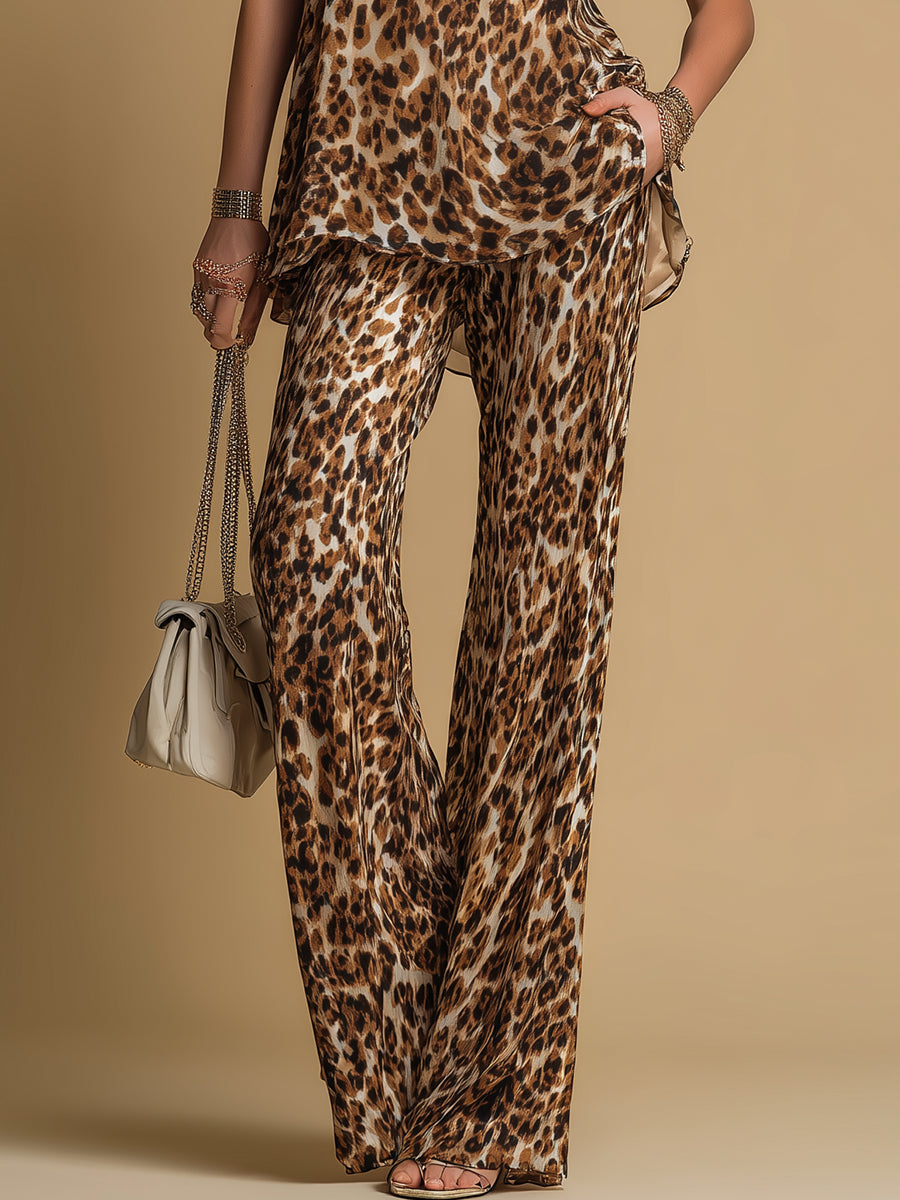 Fintia - Completo elegante con top in chiffon senza maniche stampa leopardo e pantaloni